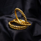 Abhinn Gold Plated Bangle Set Studded With Golden Beads For Women