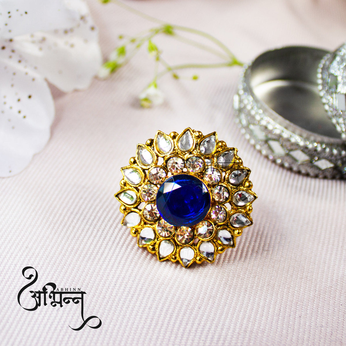 Abhinn Beautiful Royal Golden Plated Round Floral Design Ring with Blue White Crystal Stones